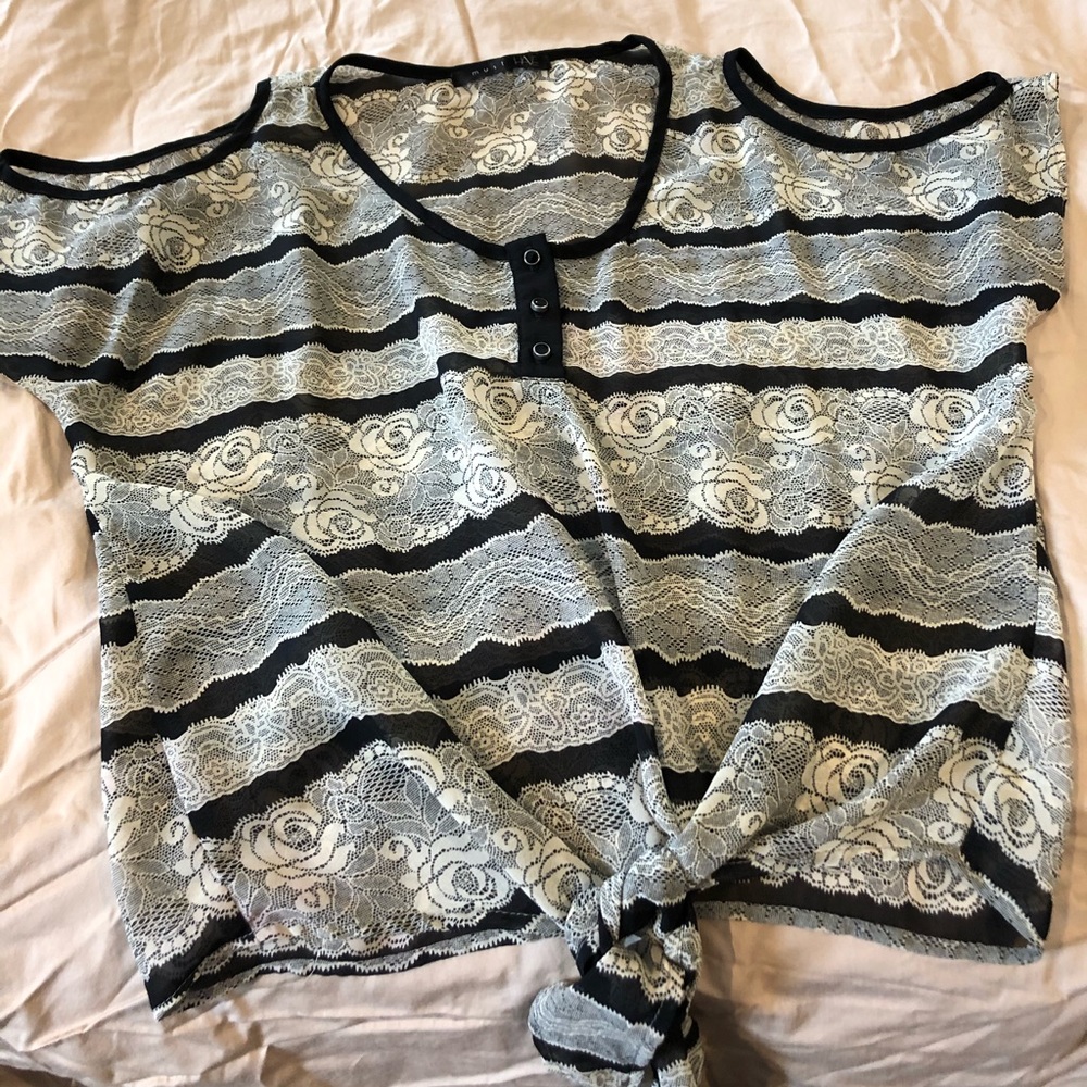 Peekaboo short sleeve sheer must have shirt.